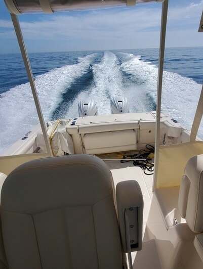 yacht Delivery by Captain James Lowe running twin outboards offshore.
